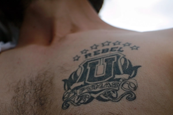 Aficionados auriazules llevan a Pumas tatuado no sólo en su corazón.
