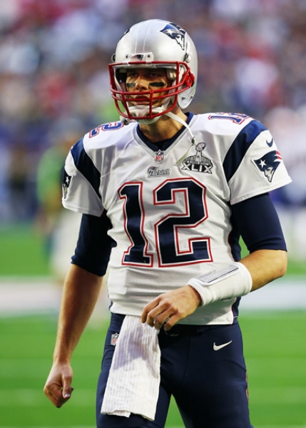 Tom Brady en su calentamiento antes del juego esperado.