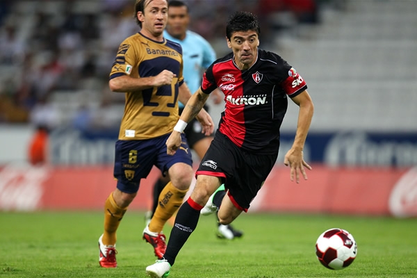 Dos viejos conocidos frente a frente: Romagnoli y Mancilla.