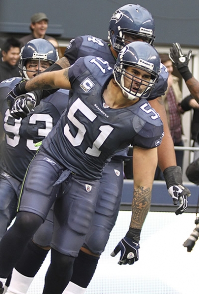 Lofa Tatupu regresó una intercepción 26 yardas para anotación.