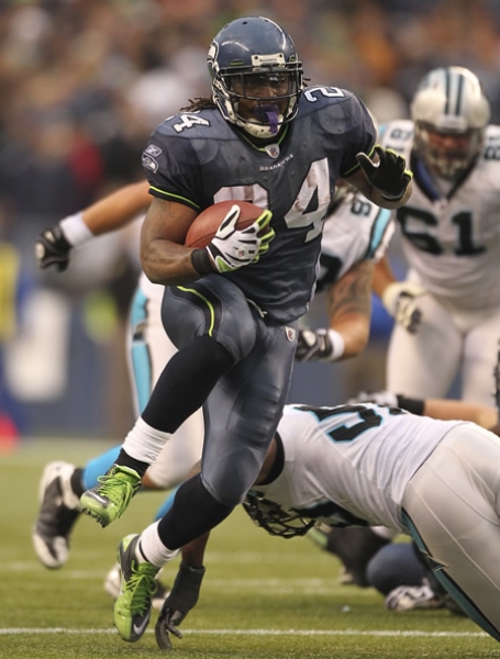 Marshawn Lynch corrió para tres TD, la mayor cifra en su carrera.