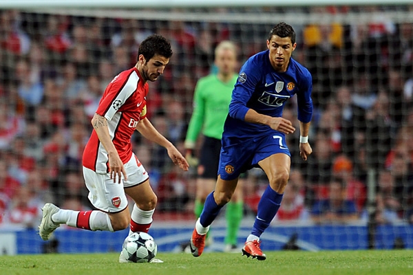Cesc Fábregas y Cristiano Ronaldo