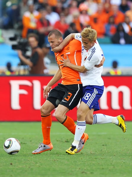Foto de acción del partido Holanda-Japón