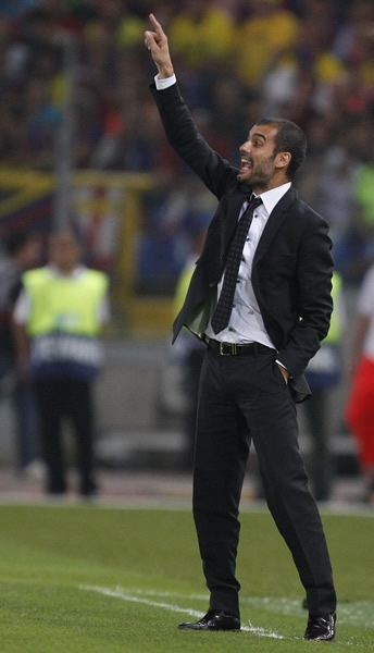 Guardiola dirige como Maestro de Orquesta.