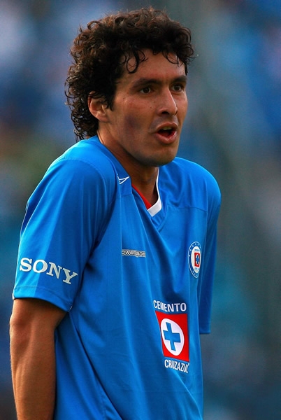 Riveros recibiendo una advertencia