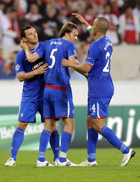 Sasa Papac y Madjid Bougherra del Glasgow celebraron el empate.
