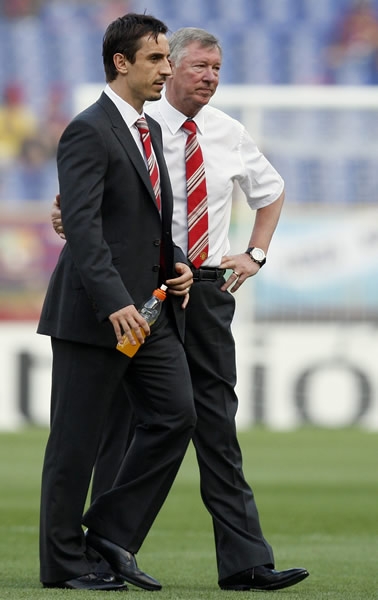 Sir Alex Ferguson con el Capitán del Manchester United.