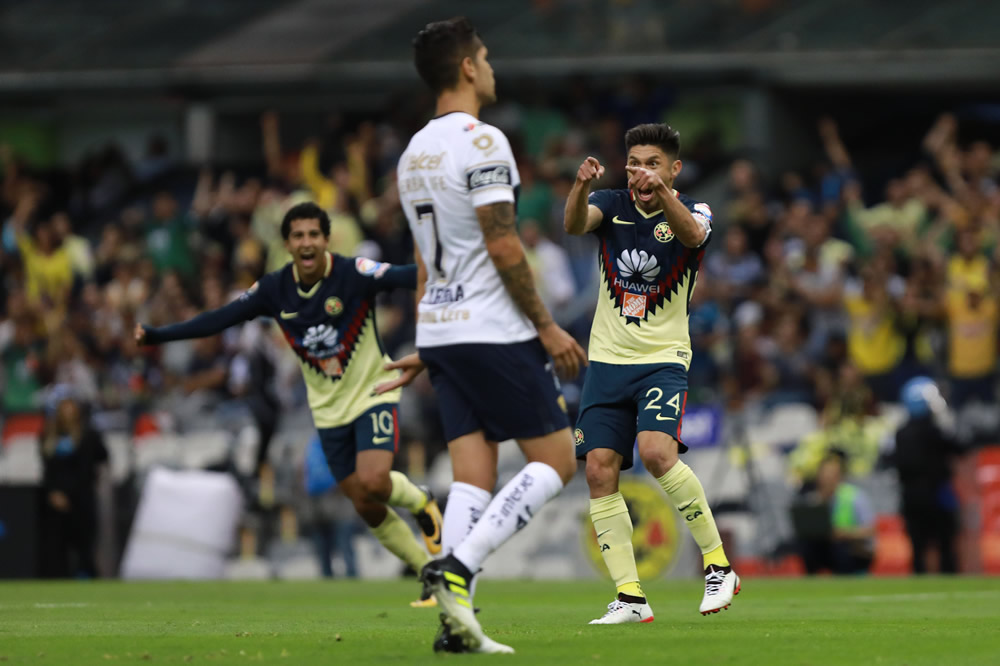 La postal de los dos sentimientos luego de un tanto.