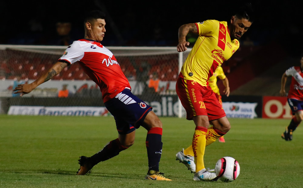 Los Tiburones Rojos vinieron de atrás para morder a Monarcas