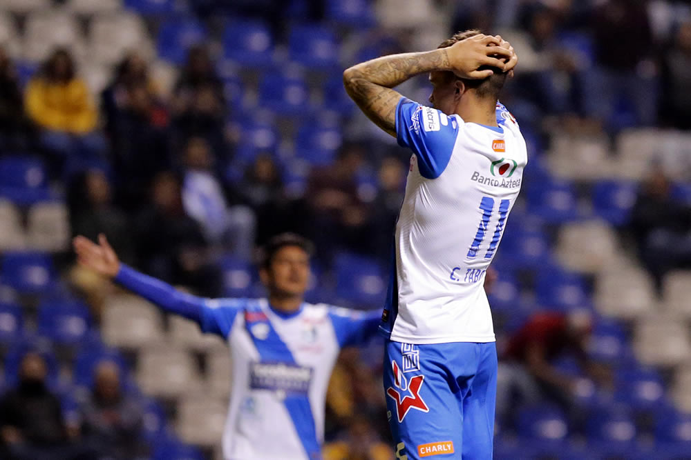 Puebla le pegó al Tigres y le abolló la corona con goles de Angulo y Acuña.