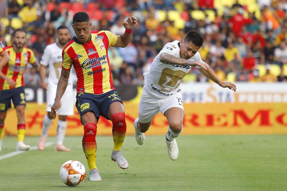 En duelo definido por lluvia, Monarcas y Pumas se reparten puntos