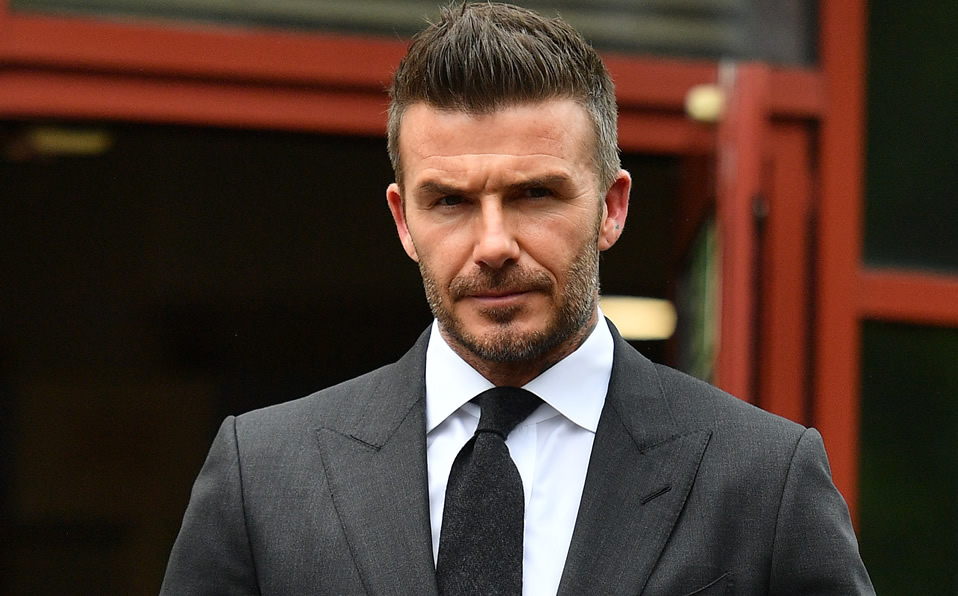 Beckham tendrá que pagar una multa por usar el celular al volante, además de tener precedentes en infracciones. (Foto: AFP)