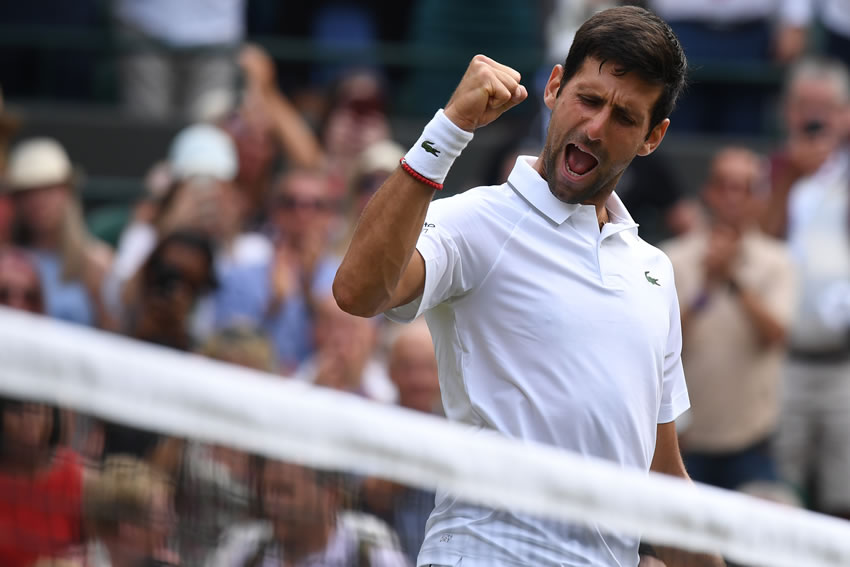 Djokovic derrotó al polaco por 7-5, 6-7 (5/7), 6-1, 6-4. (AFP)