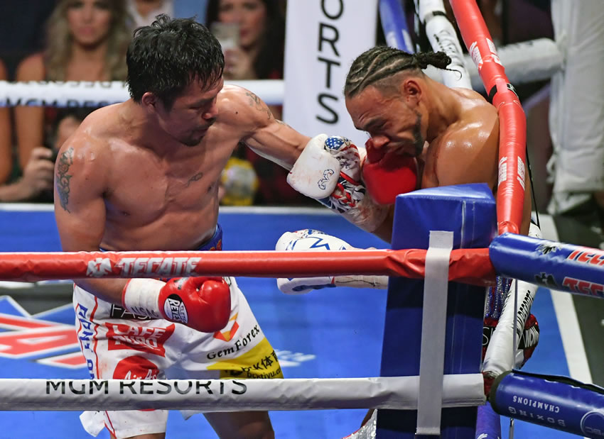 A sus 40 años, Pacquiao dio cátedra de boxeo. (AFP)