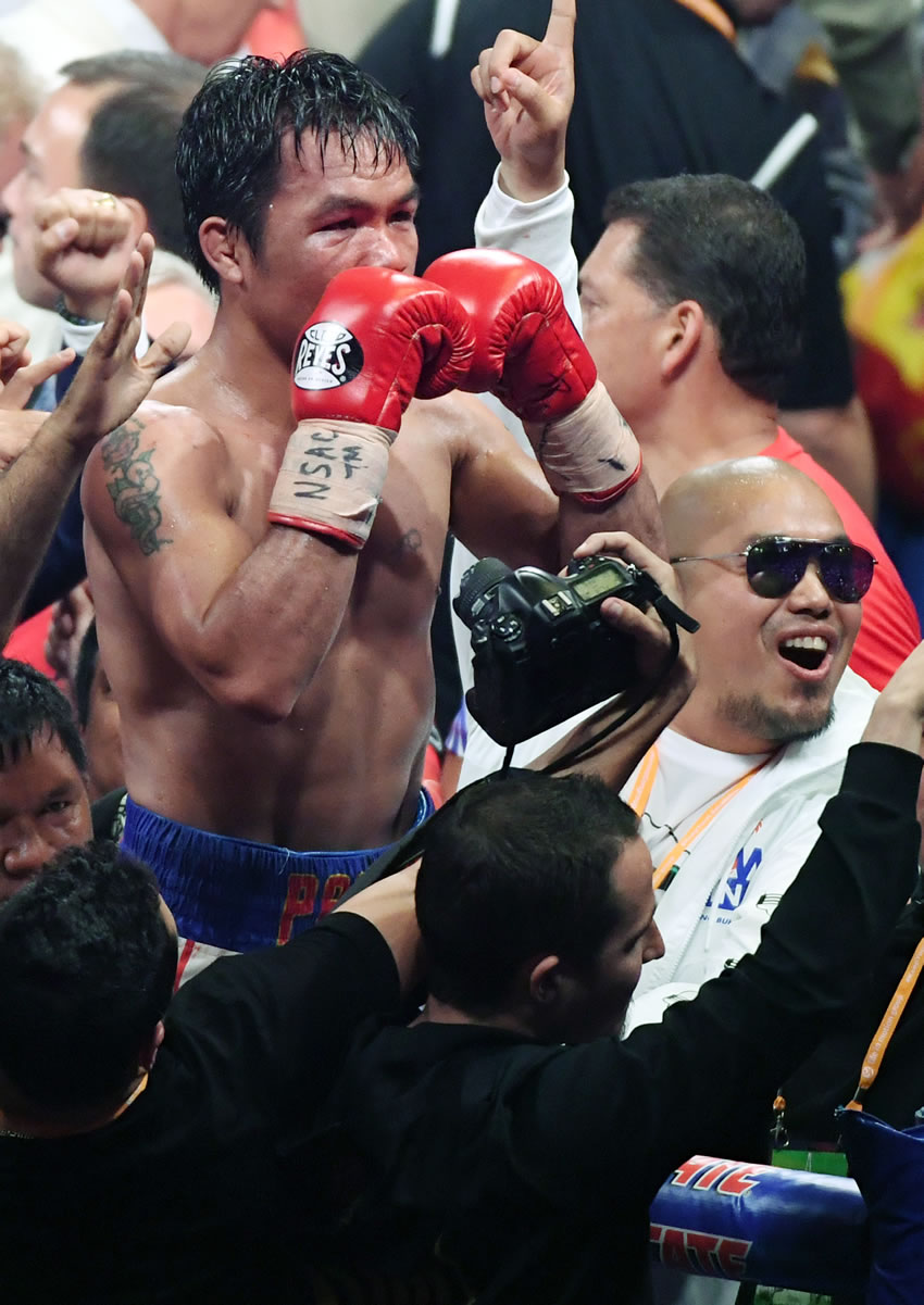 A sus 40 años, Pacquiao dio cátedra de boxeo. (AFP)