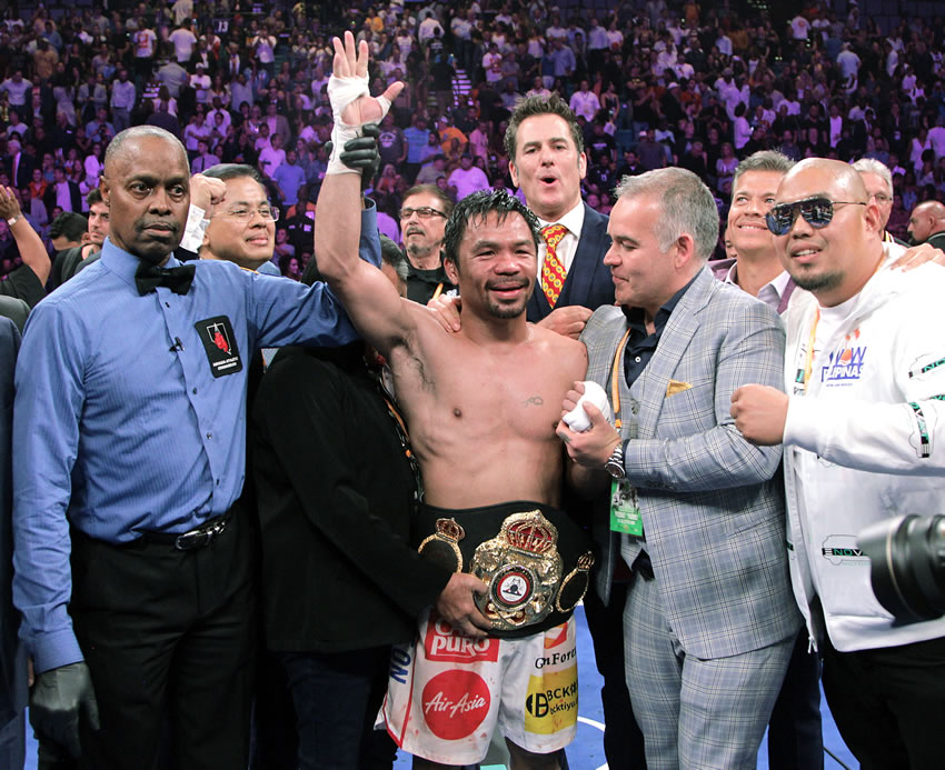 A sus 40 años, Pacquiao dio cátedra de boxeo. (AFP)