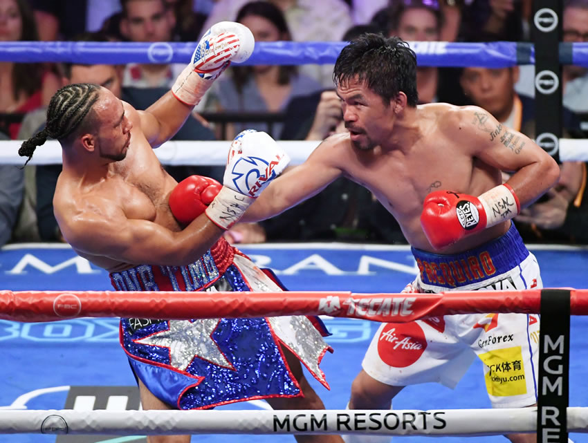 A sus 40 años, Pacquiao dio cátedra de boxeo. (AFP)