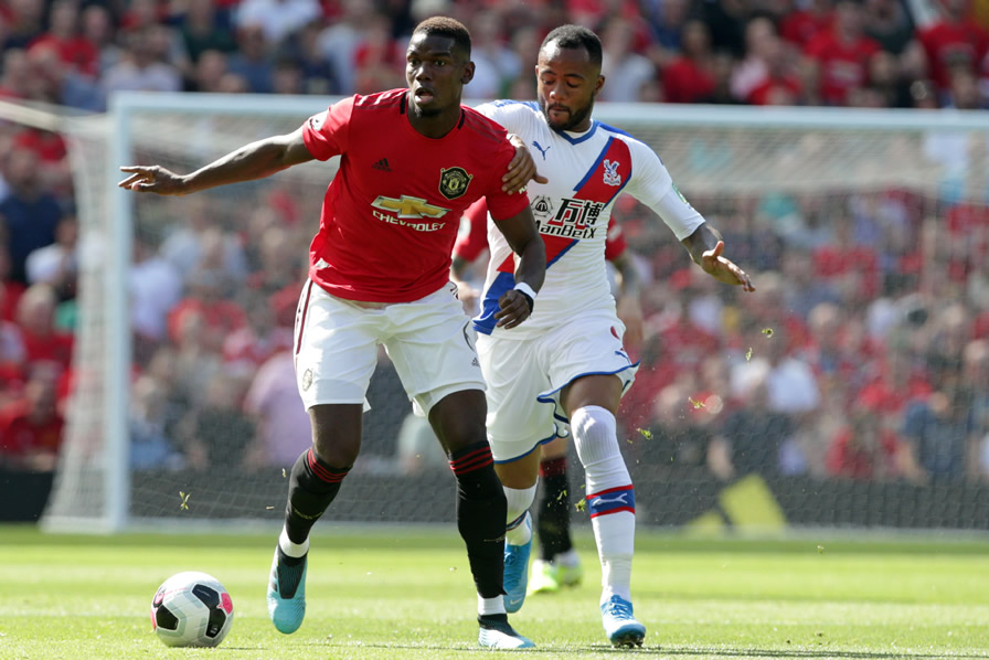 Pogba, medio del Manchester United. (Foto: AFP)