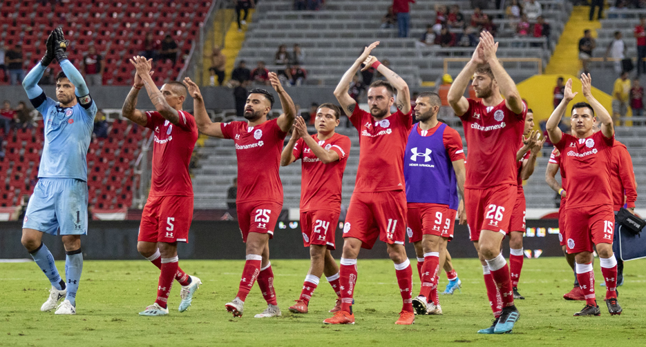 Los Diablos Rojos celebran la victoria (MEXSPORT)