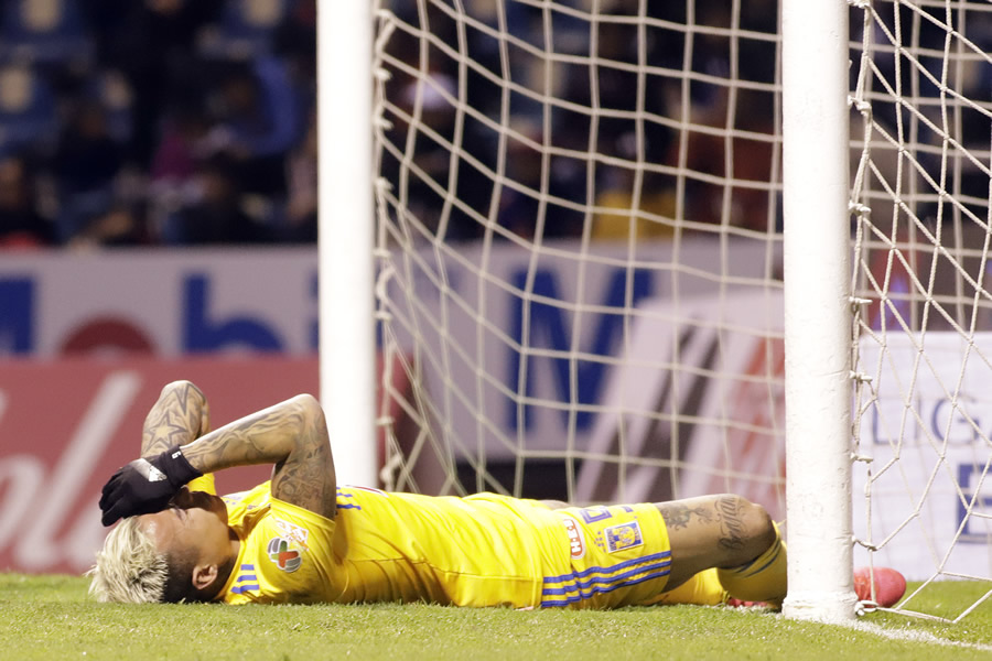 Eduardo Vargas salió lesionado en el empate entre Puebla y Tigres. (Foto: Imago7)