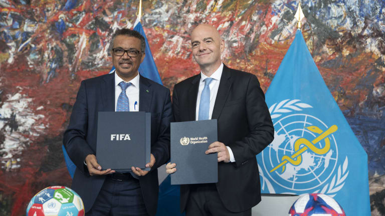 Tedros Adhanom Ghebreyesus y Gianni Infantino.
