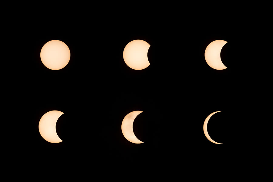 Estas imágenes muestran a la luna moviéndose frente al sol durante el eclipse solar anular. (Foto: AFP)