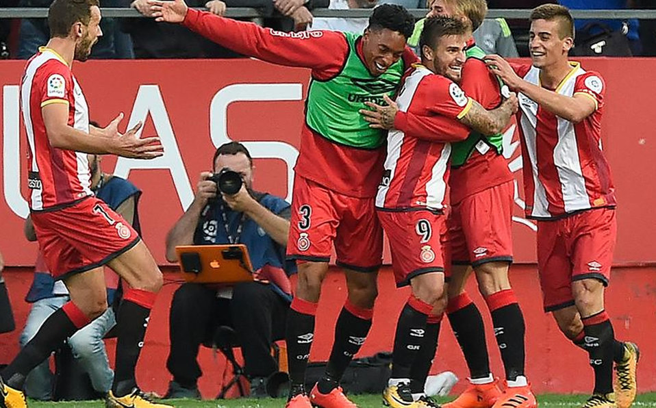 La celebración del Girona ante el Real Madrid. (AFP)