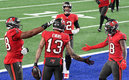 Brady conectó con Mike Evans en la zona de anotación (AFP)