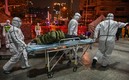 Los médicos en China libran la batalla conra el coronavirus (imagen) y ahora contra el norovirus. Foto: AFP