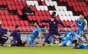 El cuadro del  Olympiacos festejó con euforia su pase. FOTO: AFP.