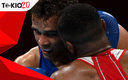 Youness Baalla (rojo) al momento de morder a David Nyika. (AFP)