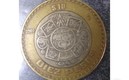 Moneda de 10 pesos donde se aprecia el error. Foto: Captura