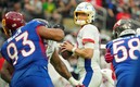 Justin Herbert lanzó dos pases de anotación. (Reuters)