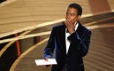 Chris Rocck tras el golpe que recibipo de Will Smith. Foto: AFP