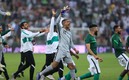 La selección de Arabia Saudita celebra tras derrotar a Australia en las Eliminatorias. Foto: AFP