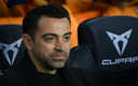 Xavi en el banquillo del Barcelona durante el duelo contra Mallorca. (AFP)
