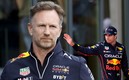 Christian Horner y Checo Pérez (AFP).