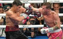 Dimitry Bivol y Canelo Álvarez (MexSport).