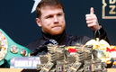 Canelo Álvarez ha ganado millones tan solo en sus tres peleas con GGG. (AFP)