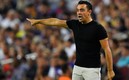 Xavi dando indicaciones ante el Rayo Vallecano. FOTO: AFP.
