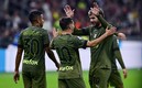 La escuadra del Milan celebrando el gol (AFP).