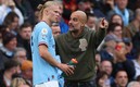 Erling Haaland y Pep Guardiola (Reuters).
