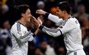 Mesu Ozil y Cristiano Ronaldo jugaron juntos en el Real Madrid. (EFE)