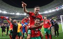 Dari y Cheddira celebrando la victoria de Marruecos. (Reuters)