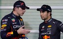 Max Verstappen y Checo Pérez | AFP