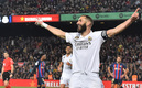 Karim Benzema celebra uno de sus tres goles ante los culés. FOTO: AFP.