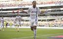 Dinho festeja uno de los dos goles que marcó en el Estadio Azteca ante el América. Foto: (Mexsport)