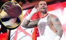 El luchador norteamericano se provocó la herida en la frente para simular heridas por la batalla en el ring. Foto: (Especial)