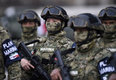 Mujeres militares aportaron en el evento. (Foto: AFP)