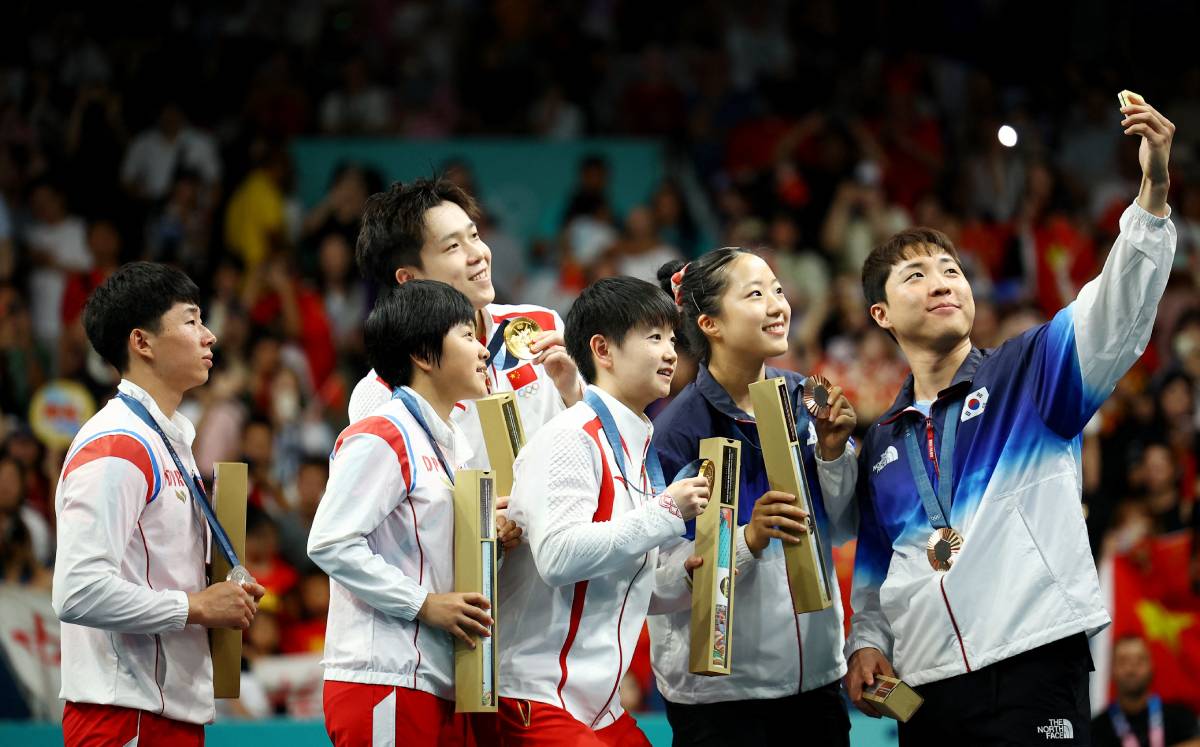 Selfie en el tenis de mesa de Juegos Olímpicos (Reuters)
